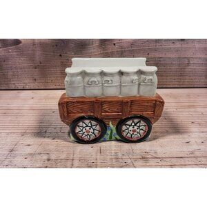 vintage 1998 cracker barrel ceramic wagon shaped napkin holder.